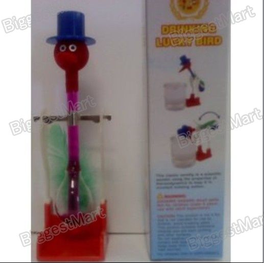 Novelty Glass Drinking Dipping Dippy Bird Toy Purple  