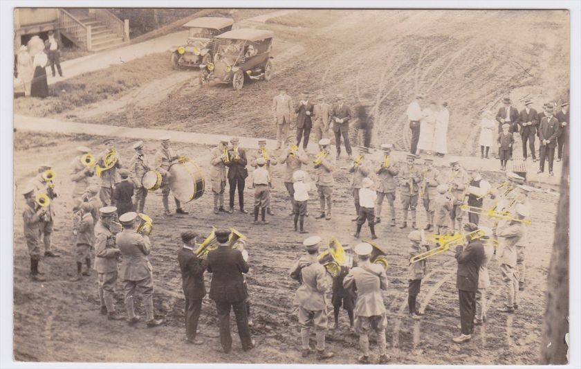 Early 1900s Unidentified RPPC Street View of People Cars & Band 