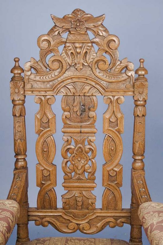 This chair back has the black stain. The carvings on the back are a 