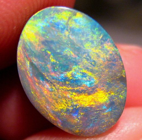 Black Opal   4.4 Carats 14 x 10mm Brilliant  