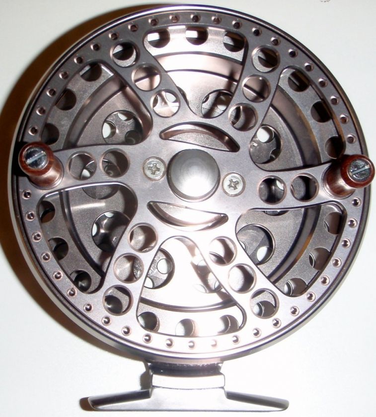 OKUMA S 1002 SILVER SHEFFIELD CENTER PIN REEL  