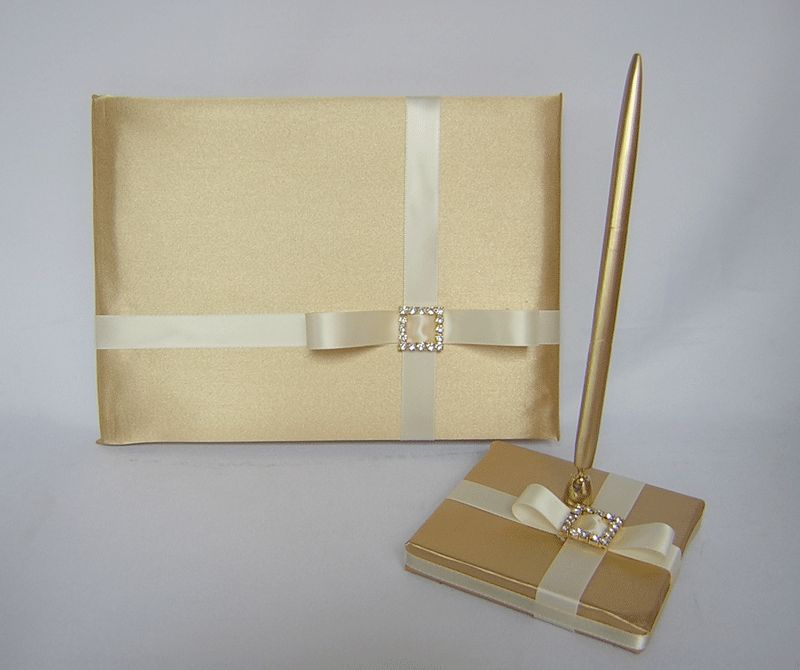   the gold guest pen holder is decorated with same beautiful details