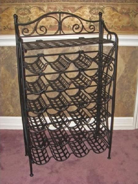 MANDALAY IRON 24 BOTTLE WINE RACK in an ANTIQUE BLACK FINISH 